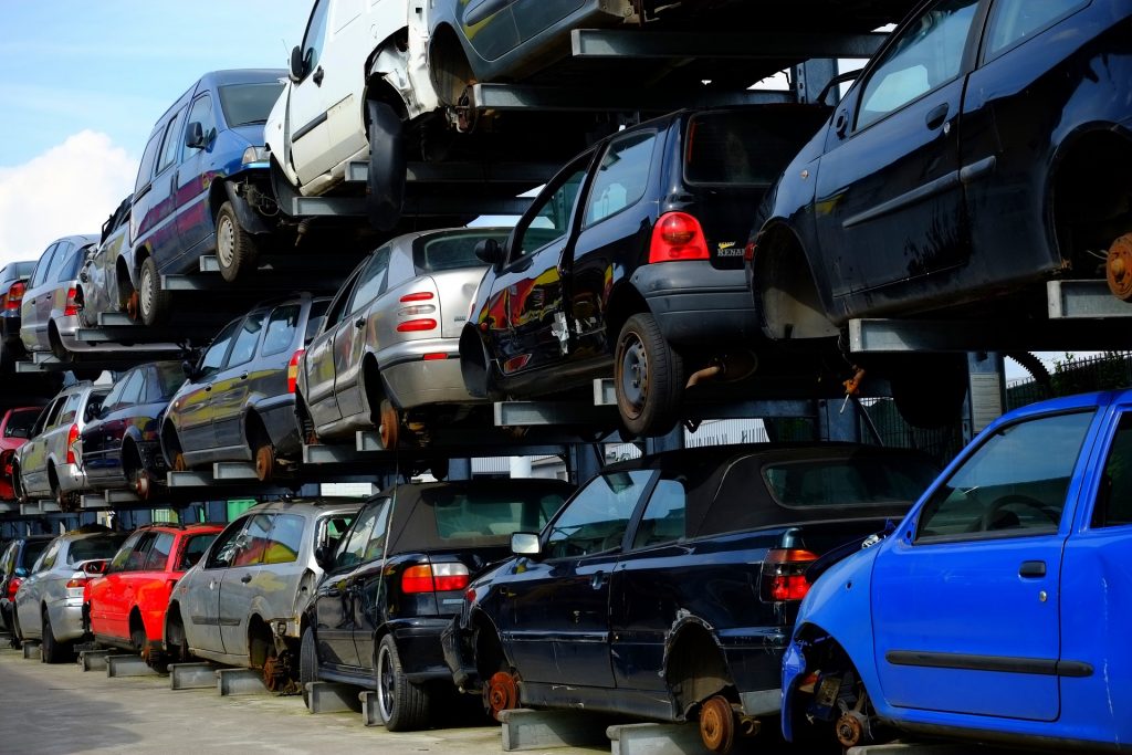 A pile of cars that have been scrapped