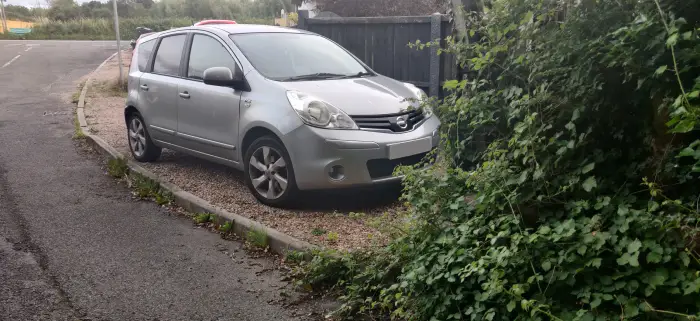 Nissan Note parked off the road